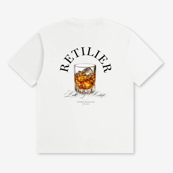 A white short-sleeve t-shirt shown from the back, featuring a graphic print of an whiskey glass with amber liquid and the word 'RETAILIER' arched above it in black.