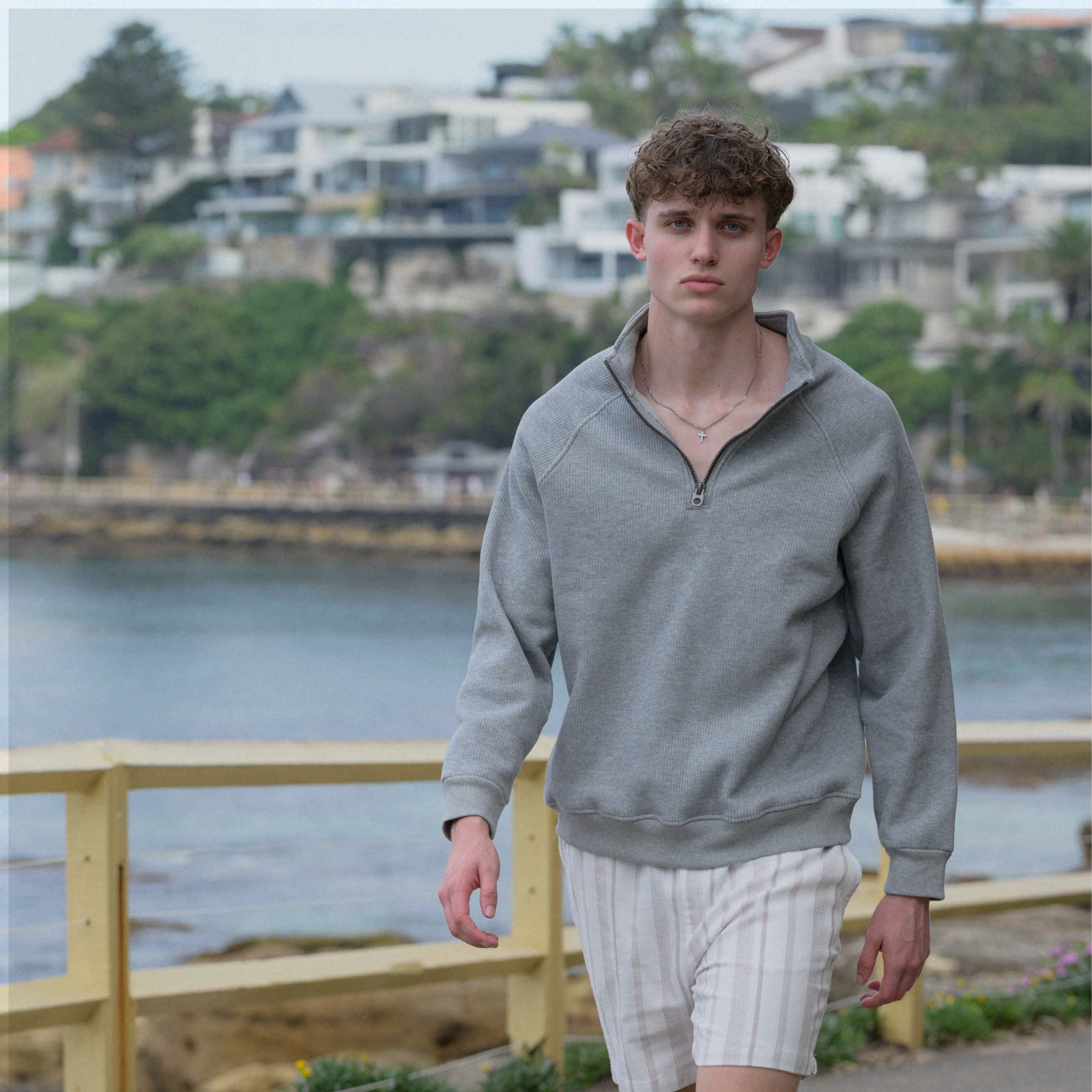 RETILIER QUARTER ZIP